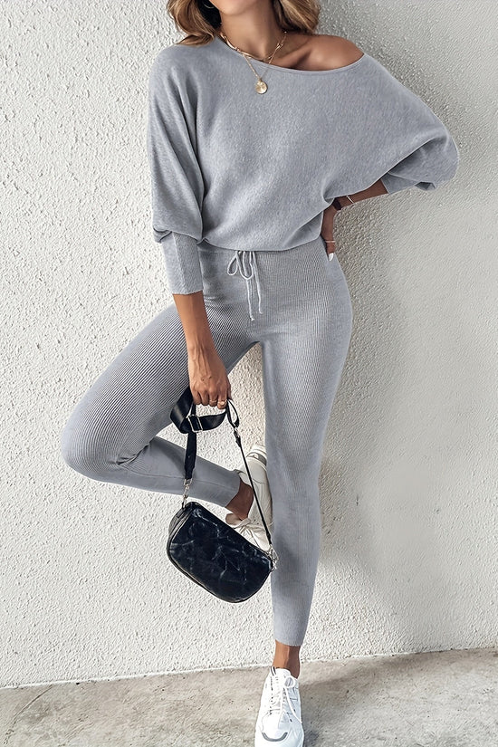 Casual Two-Piece Outfit Featuring A Long-Sleeve Pullover And High-Waisted Drawstring Pants 